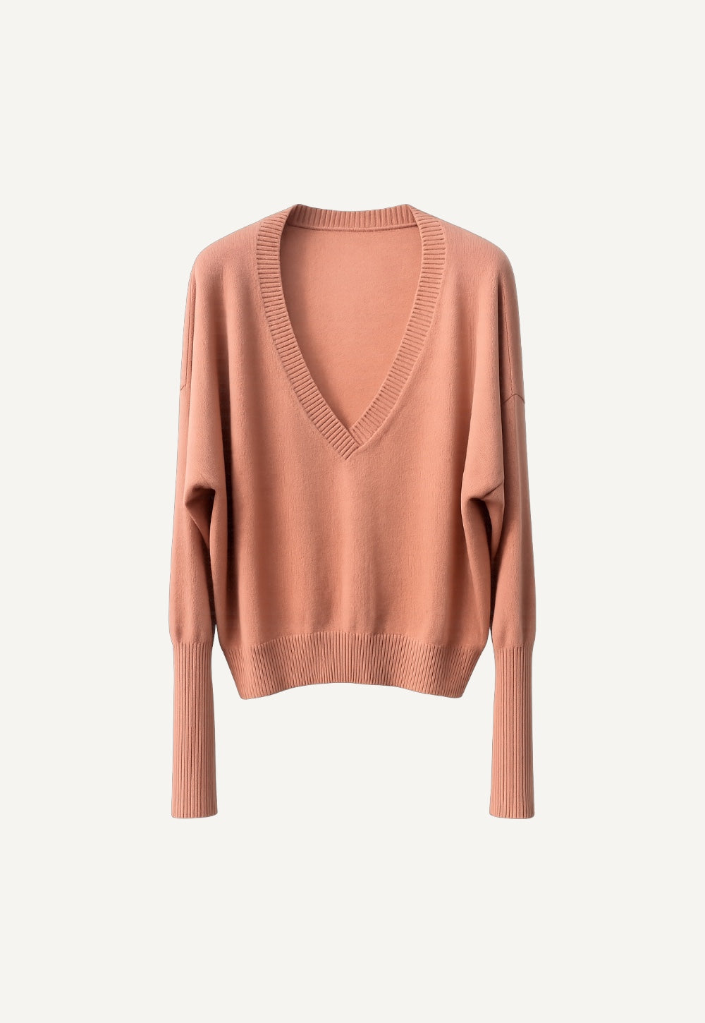 Terracotta V-neck sweater in fine knit with elongated ribbed cuffs, relaxed silhouette
