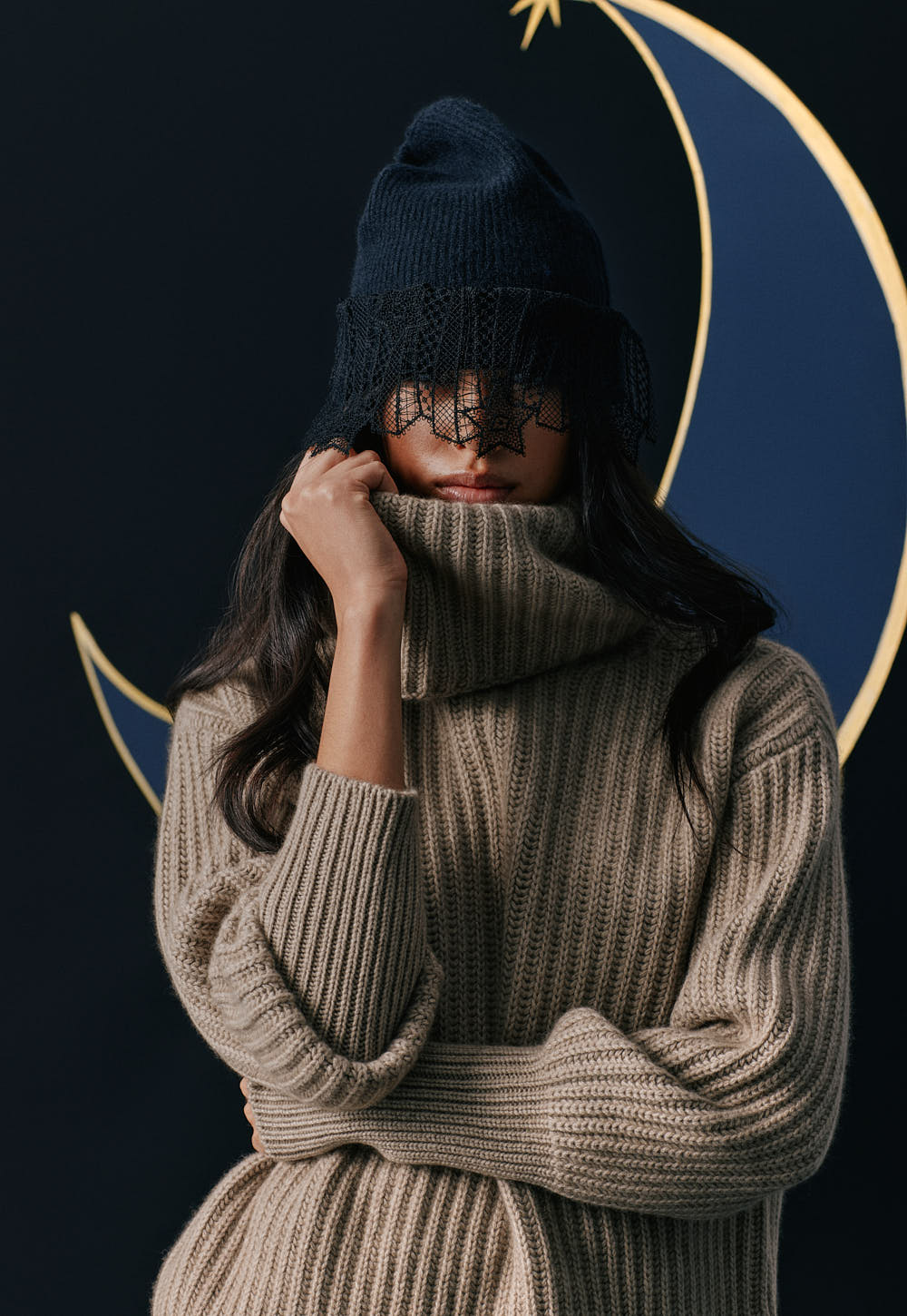 Cashmere turtleneck sweater in soft beige styled with knit beanie, Autumn Winter 2026 collection