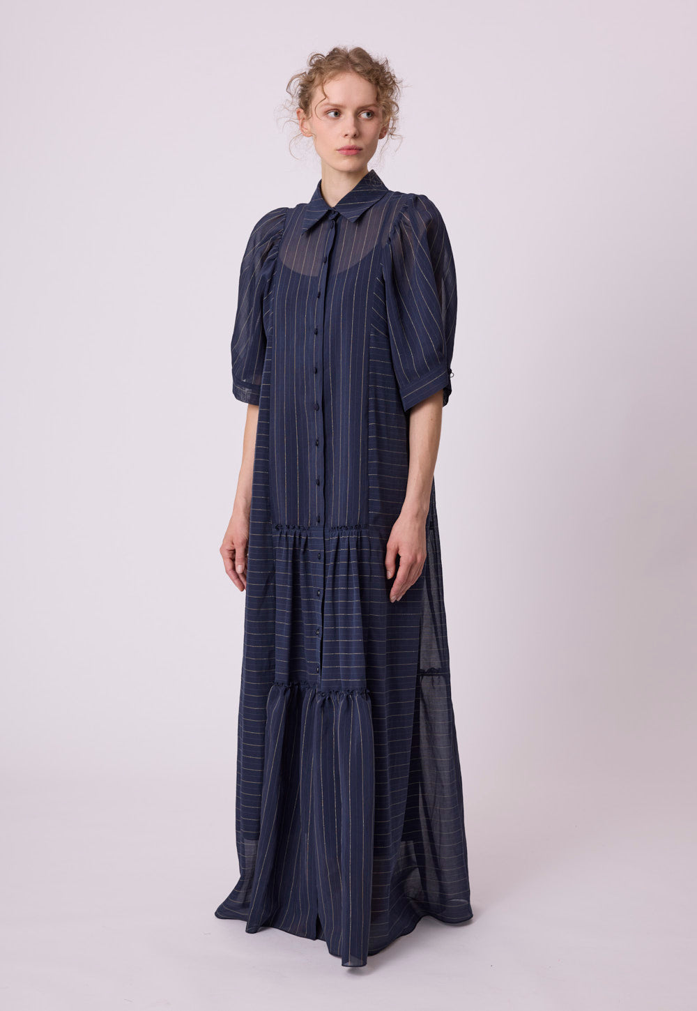 Nora Dress navy blue by Antonia Zander, styled view.