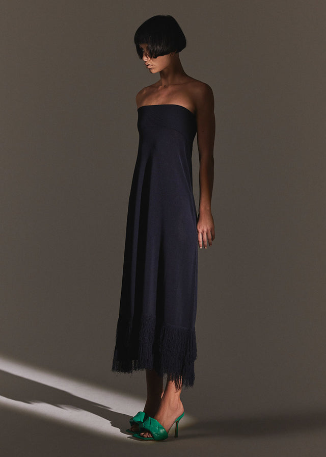 allrounder - can be worn as skirt or dress. knit skirt dress with high hem and fring detail on bottom