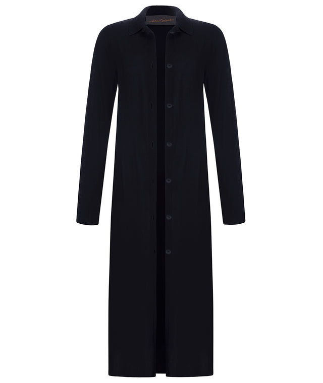 adjustable by extra waistband, buttoned through shirtdress. can be worn as dress or coat 
