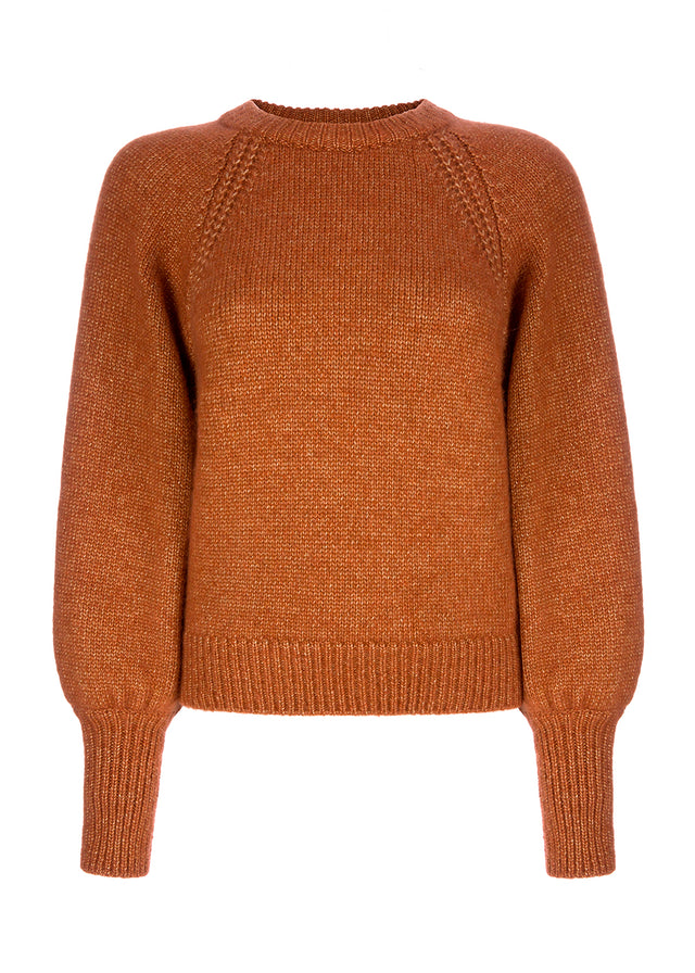 luxurious blen: cashmere,silk,alpaca and a hint of glitter. puffy sleeves and a raglan detail 